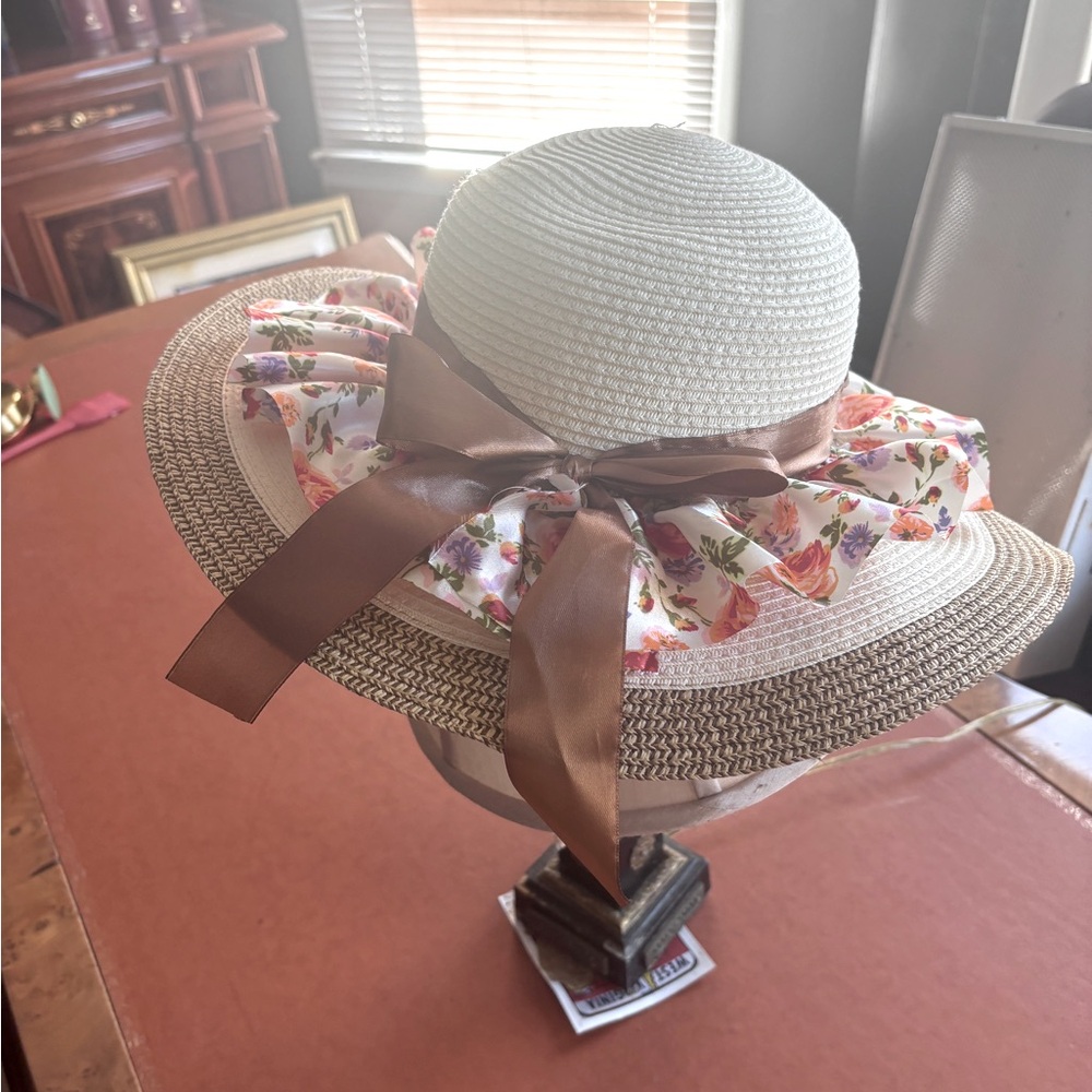 Beautiful straw hat with colorful ribbons